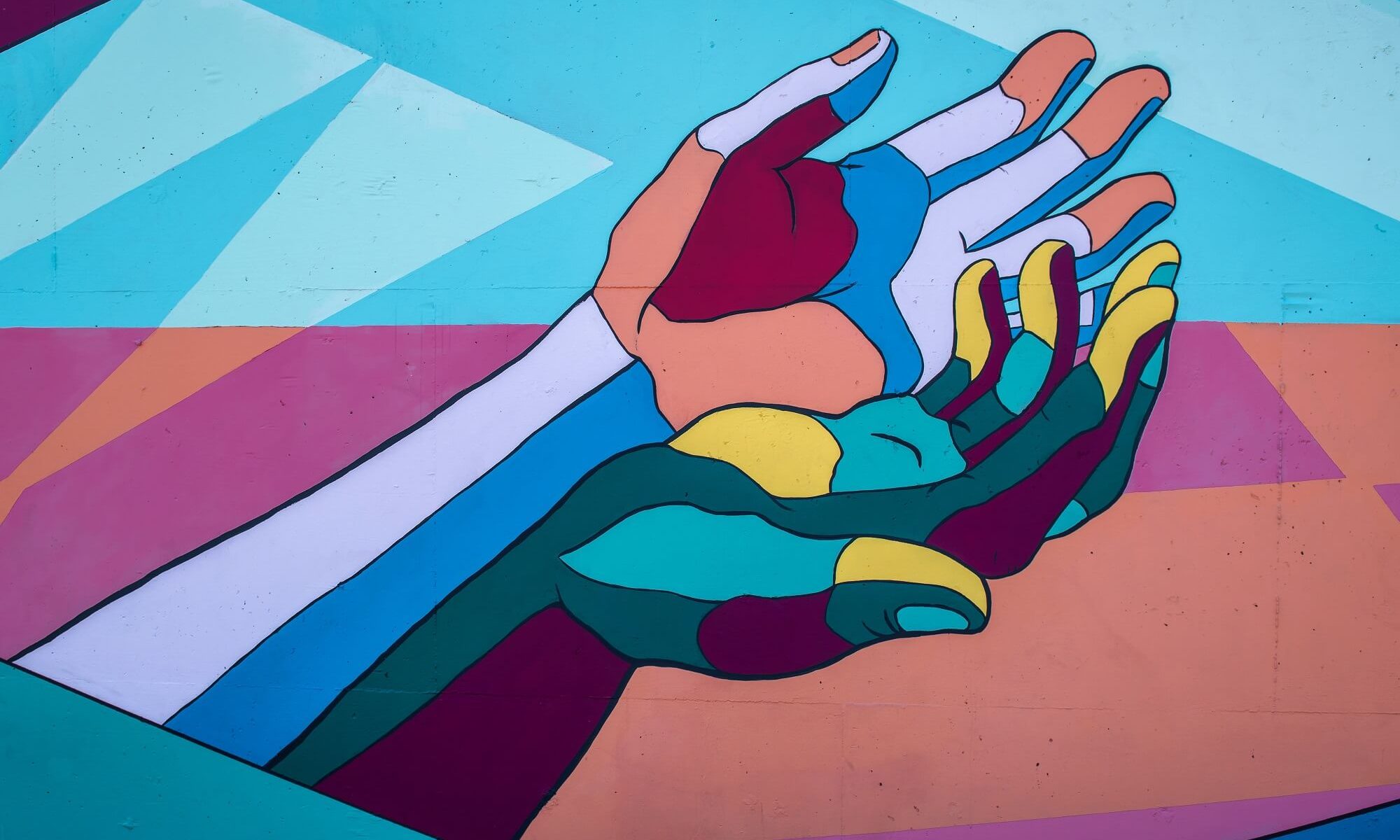 desenho de duas mãos coloridas se tocando